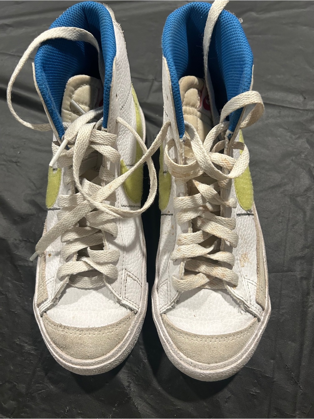 Nike Kids White High-Top Sneakers with Blue Lining and Yellow Accents
